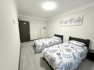 Ένα ή περισσότερα κρεβάτια σε δωμάτιο στο ARTAL Apartment on Obolonskyi Avenue 16