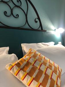 Postel nebo postele na pokoji v ubytování DIMOR'A' ROOMS