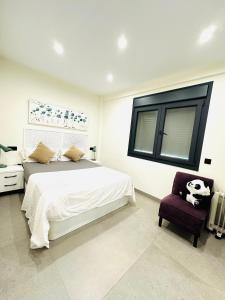 Ένα ή περισσότερα κρεβάτια σε δωμάτιο στο private room in the central beach of estepona +2 φωτογραφίες