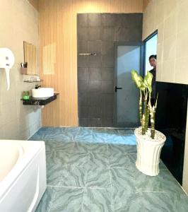 Koupelna v ubytování Maria Hotel
