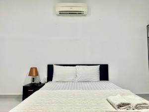 Postel nebo postele na pokoji v ubytování Maria Hotel