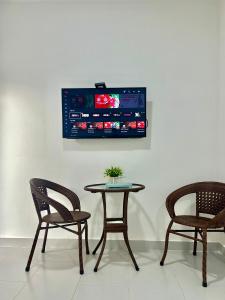 TV a/nebo společenská místnost v ubytování Maria Hotel
