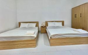 Postel nebo postele na pokoji v ubytování Maria Hotel