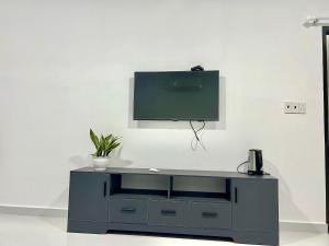 TV a/nebo společenská místnost v ubytování Maria Hotel