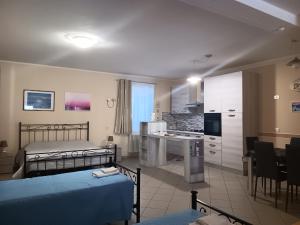 Kuchyňa alebo kuchynka v ubytovaní casa vacanze iris, appartamento turistico