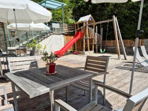 Patio alebo iná vonkajšia časť ubytovania Alpenpension Gastein