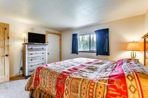 a bedroom with a bed and a window at Winter Park Condo w/ Resort Shuttle On-Site! in Winter Park +17 photos