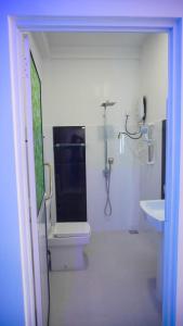 Kupatilo u objektu Dinuda Resort