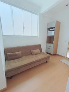 Posezení v ubytování Ap Tropical 2 piscina com aquecimento solar e churrasqueira