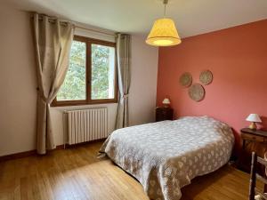 Uma cama ou camas num quarto em Chalet Perce Neige Barcelonnette