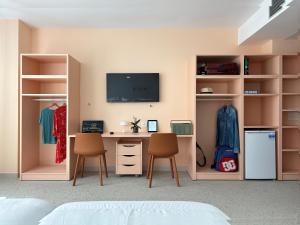 TV a/nebo společenská místnost v ubytování Loop Homes Tower Burjassot Hotel
