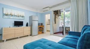 TV a/nebo společenská místnost v ubytování Apartamentos TSS Alboran