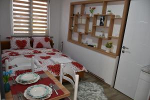 Ένα ή περισσότερα κρεβάτια σε δωμάτιο στο Apartments Mensa