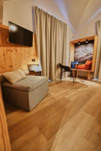 A television and/or entertainment centre at Albergo Meublè Vecchio Scarpone