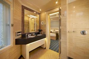 Vonios kambarys apgyvendinimo įstaigoje EA Hotel Atlantic Palace