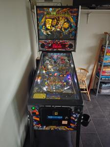 eine Klauenmaschine für Videospiele in einem Zimmer in der Unterkunft Vuohimäki Camping Savonlinna in Savonlinna