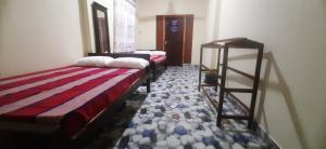 Letto o letti in una camera di Lucy Resort