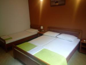 Posteľ alebo postele v izbe v ubytovaní Apartments Salamun