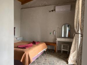 Postel nebo postele na pokoji v ubytování Hamre Apartments (Nicholas)