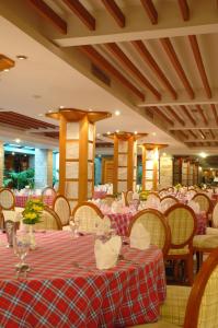 Reštaurácia alebo iné gastronomické zariadenie v ubytovaní The Camelot Hotel Pattaya