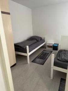Vuode tai vuoteita majoituspaikassa Zimmervermietung Ennsdorf