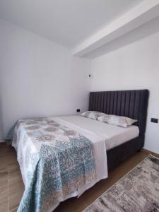 Rúm í herbergi á Vila Ideal