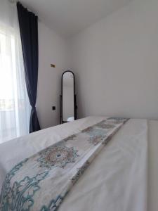 Rúm í herbergi á Vila Ideal