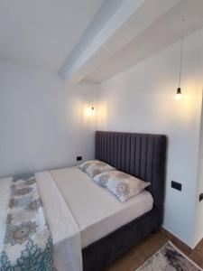 Rúm í herbergi á Vila Ideal