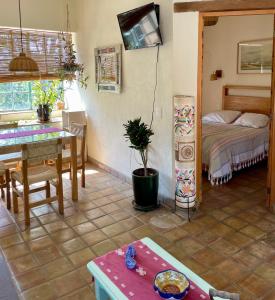 Ένα ή περισσότερα κρεβάτια σε δωμάτιο στο El Pocito Quiet Bungalow