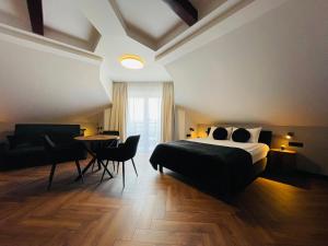 Posteľ alebo postele v izbe v ubytovaní Hotel Millennium