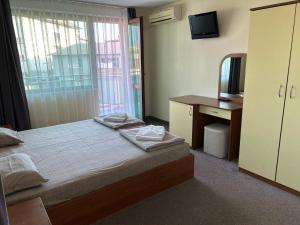 Postel nebo postele na pokoji v ubytování Hotel SOLE + 37 fotografií
