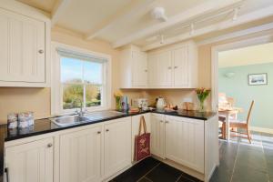 Køkken eller tekøkken på Faraway Cottage