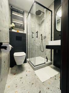 Koupelna v ubytování Hotel Millennium
