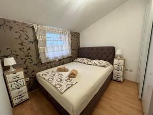 Postel nebo postele na pokoji v ubytování Apartment Paša