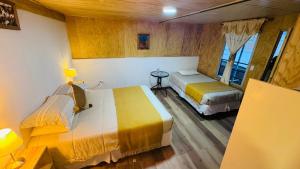 Postel nebo postele na pokoji v ubytování Casa Ñawi + 10 fotografií