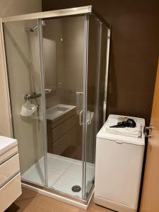 Ένα μπάνιο στο Vigo Center Rooms