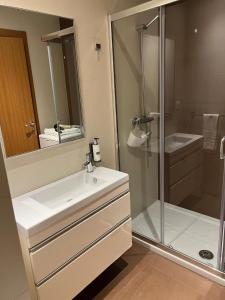Ένα μπάνιο στο Vigo Center Rooms