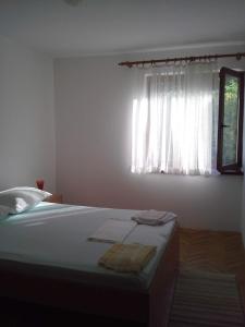Posteľ alebo postele v izbe v ubytovaní Apartman Pavla