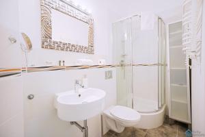 Kúpeľňa v ubytovaní Atelier Herbst by Noclegi Renters