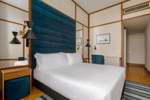Cama ou camas em um quarto em Room Mate Luca, Florence
