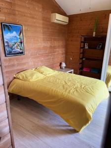 Postel nebo postele na pokoji v ubytování La Bananeraie Apt 35m2 piscine jardin tropical parking privé + 25 fotografií