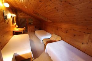 Postel nebo postele na pokoji v ubytování Arnica 2 + 3 fotografie