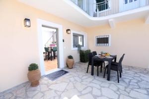Balkón nebo terasa v ubytování Vlachos Maisonette + 18 fotografií