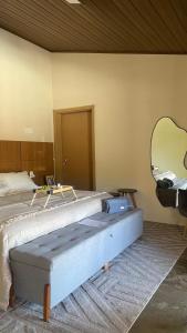 Postel nebo postele na pokoji v ubytování Chalé Villa Odara