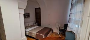Ένα ή περισσότερα κρεβάτια σε δωμάτιο στο VIKSI hostel