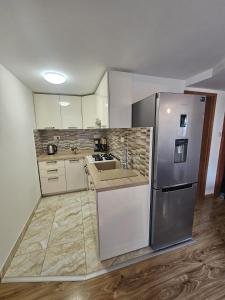 Kuchyň nebo kuchyňský kout v ubytování Apartment Medved