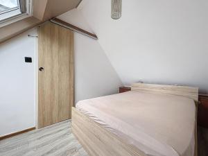 Posteľ alebo postele v izbe v ubytovaní Escapade marine a carnac Maison 4 personnes toute équipée, au calme entre plage et ville