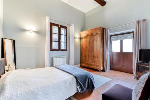 Postel nebo postele na pokoji v ubytování Maison Dix Chambres d'hôtes et Espace SPA Bien être