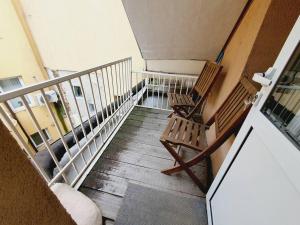 En balkon eller terrasse på Mateo Center + 4 billeder