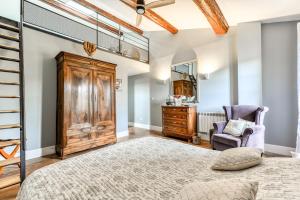 Posezení v ubytování Maison Dix Chambres d'hôtes et Espace SPA Bien être
